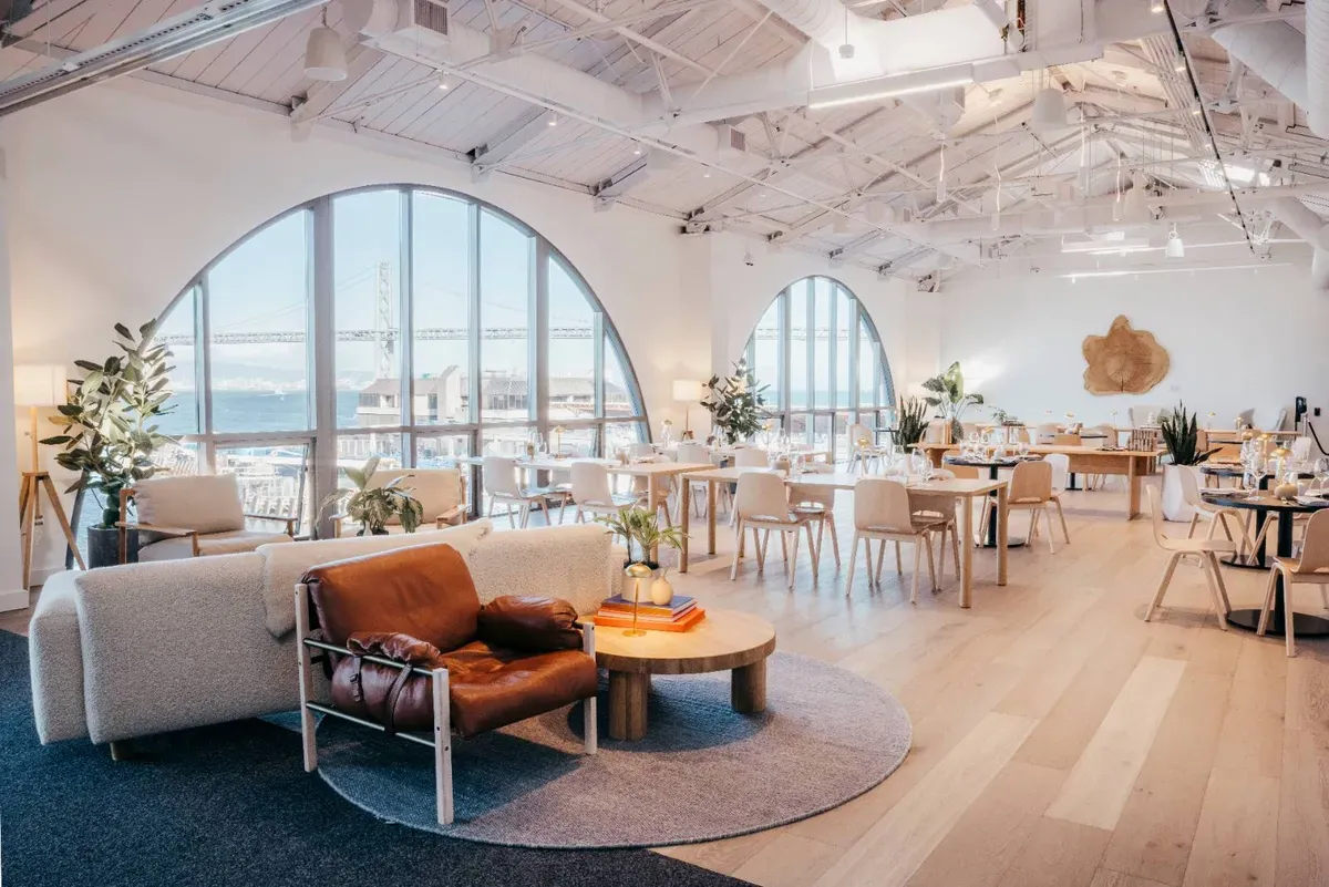 SHACK15's daytime view featuring bay bridge views through arched windows